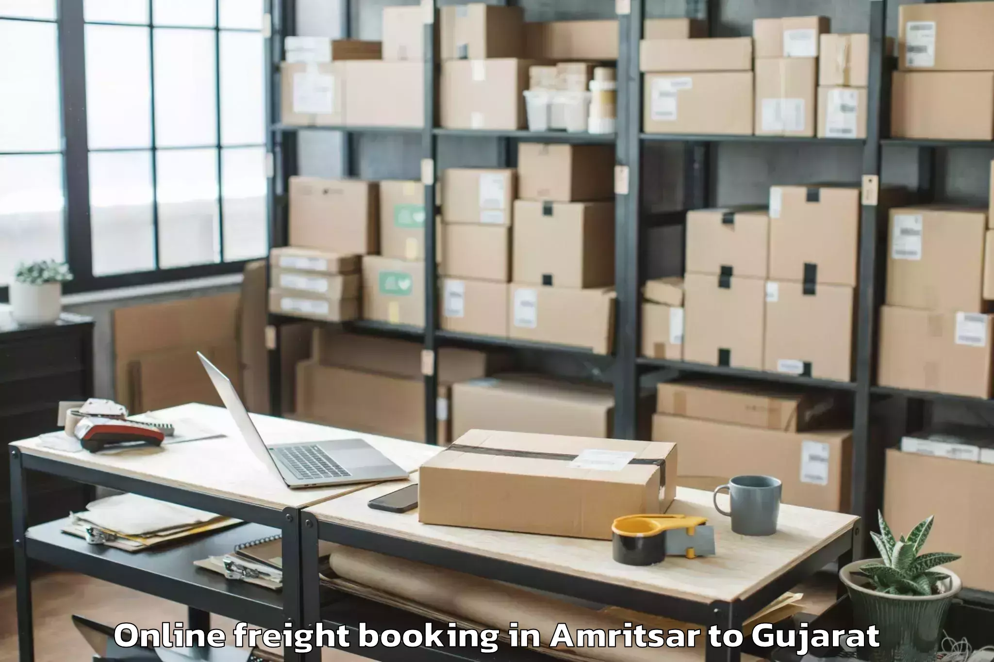 Trusted Amritsar to Hansot Online Freight Booking